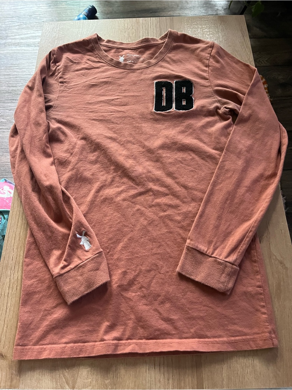 Dutch Bros Rust Orange Long Sleeve Crewneck Tee with DB Patch